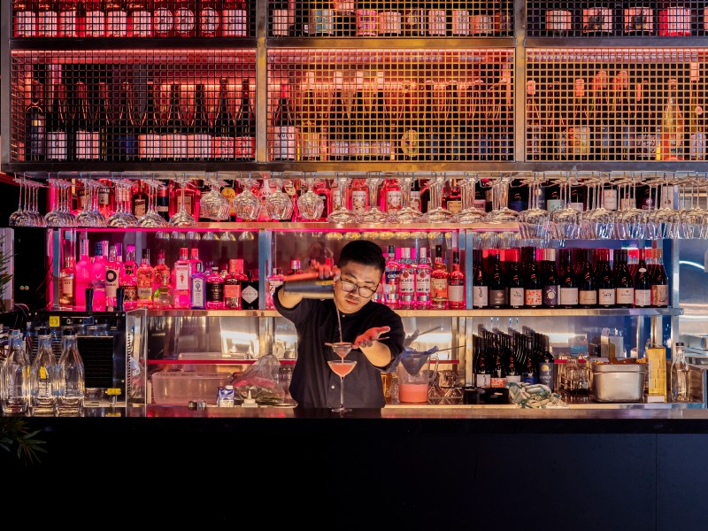 Peter Pham behind the bar at Hey Chu